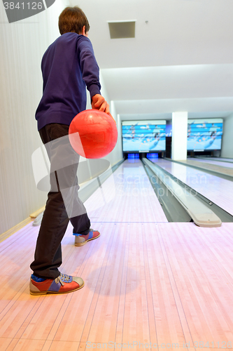 Image of Young boy on bowling lane