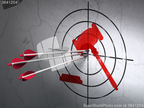 Image of Law concept: arrows in Gavel target on wall background
