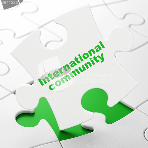 Image of Political concept: International Community on puzzle background