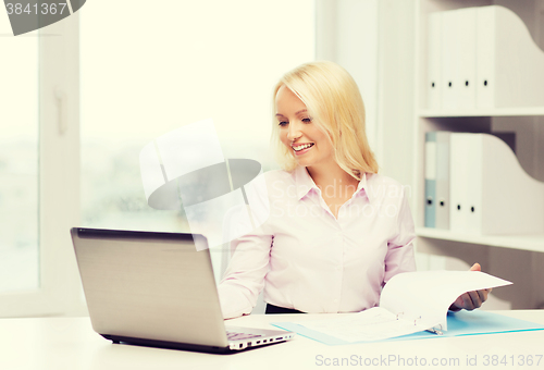 Image of smiling businesswoman or student with laptop