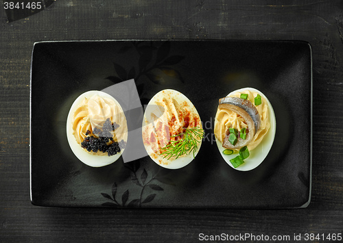 Image of various boiled stuffed eggs