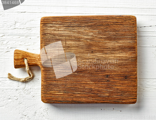 Image of Cutting board on white wooden table