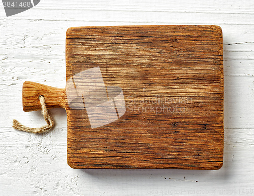 Image of Cutting board on white wooden table