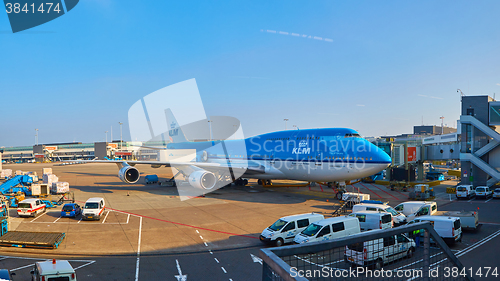 Image of KLM plane being loaded at Schiphol Airport. Amsterdam, Netherlands