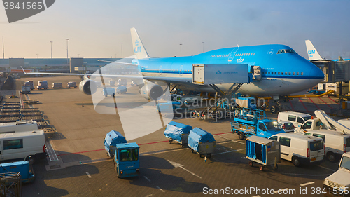 Image of KLM plane being loaded at Schiphol Airport. Amsterdam, Netherlands