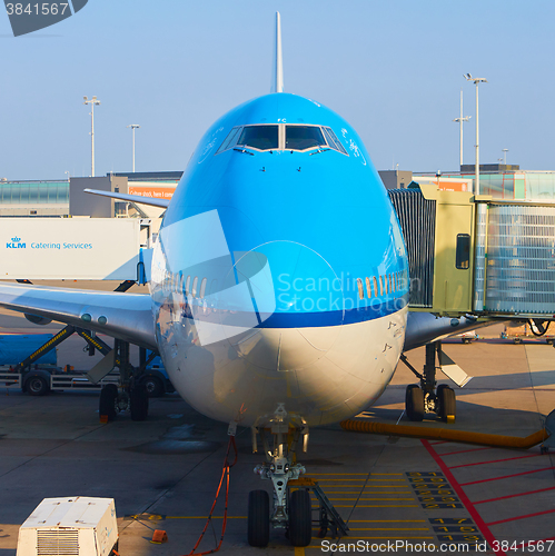 Image of KLM plane being loaded at Schiphol Airport. Amsterdam, Netherlands