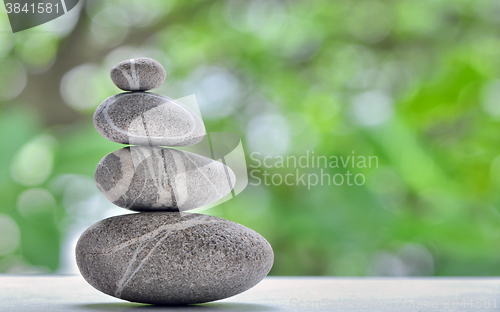 Image of Stack of four stones isolated