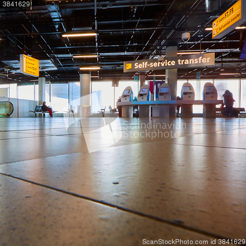 Image of self check-in kiosk in Amsterdam Airport Schiphol.