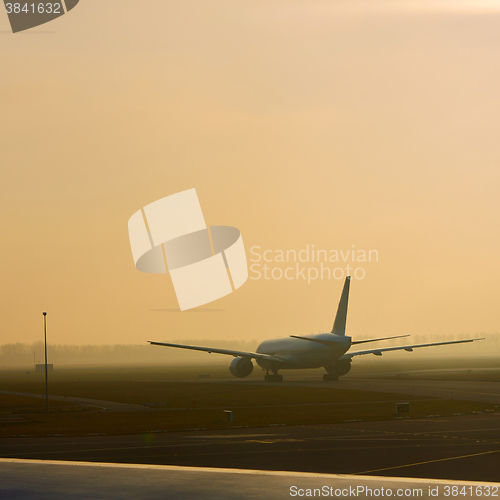 Image of  Airplane departing from Airport Schiphol.