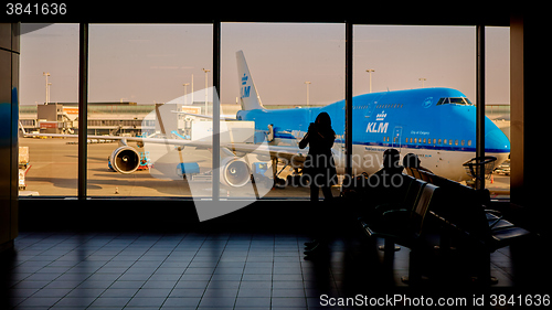 Image of KLM plane being loaded at Schiphol Airport. Amsterdam, Netherlands