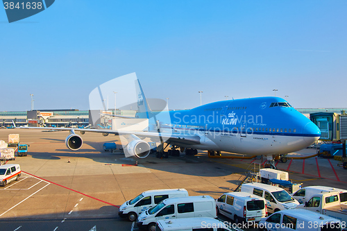 Image of KLM plane being loaded at Schiphol Airport. Amsterdam, Netherlands