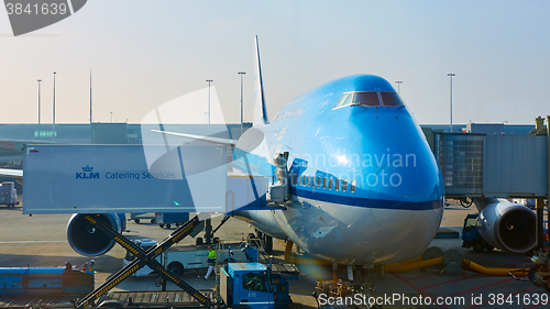 Image of KLM plane being loaded at Schiphol Airport. Amsterdam, Netherlands