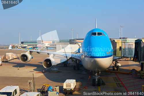 Image of KLM plane being loaded at Schiphol Airport. Amsterdam, Netherlands