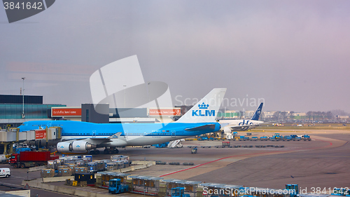 Image of KLM plane being loaded at Schiphol Airport. Amsterdam, Netherlands