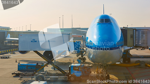 Image of KLM plane being loaded at Schiphol Airport. Amsterdam, Netherlands