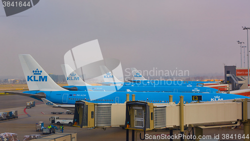 Image of KLM plane being loaded at Schiphol Airport. Amsterdam, Netherlands