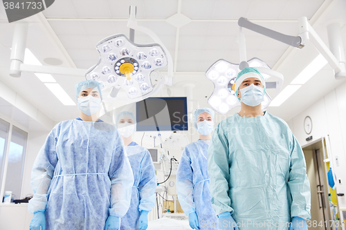 Image of group of surgeons in operating room at hospital