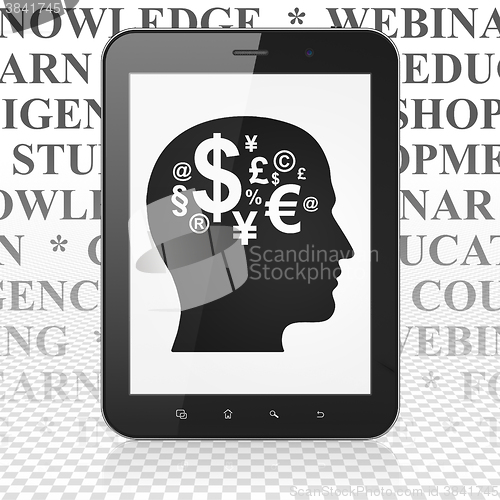 Image of Learning concept: Tablet Computer with Head With Finance Symbol on display