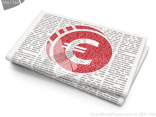 Image of Banking concept: Euro Coin on Newspaper background