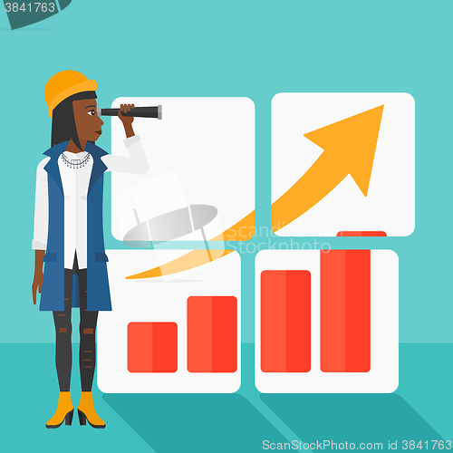 Image of Woman looking at positive bar chart.