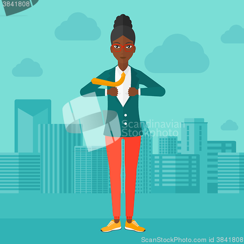 Image of Business woman taking off jacket.