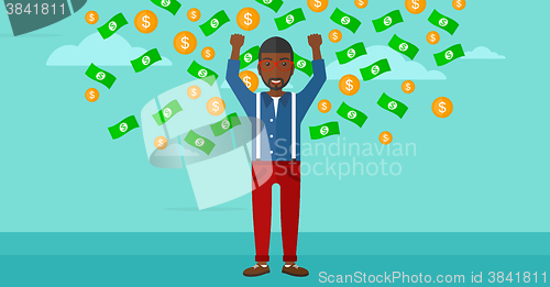 Image of Happy man with  flying money. 