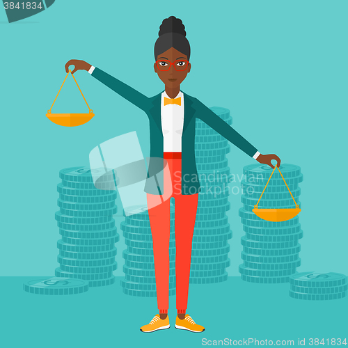 Image of Business woman with scales.