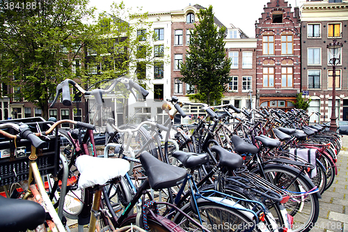 Image of AMSTERDAM; THE NETHERLANDS - AUGUST 16; 2015: Lots of bicycles p