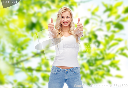 Image of happy young woman or teenage girl in white t-shirt