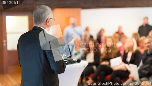 Image of Speaker at Business Conference and Presentation.