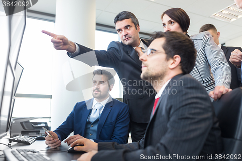 Image of Business team working in corporate office.