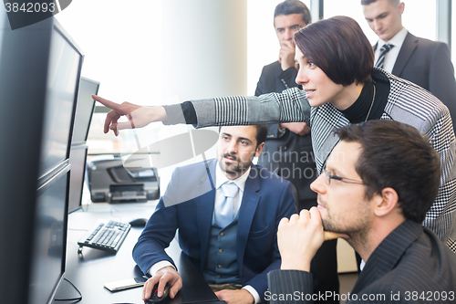 Image of Business team working in corporate office.