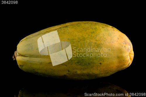 Image of Papaya fruit on black background