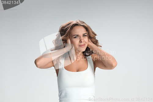 Image of The young woman\'s portrait with pain emotions