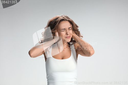 Image of The young woman\'s portrait with pain emotions