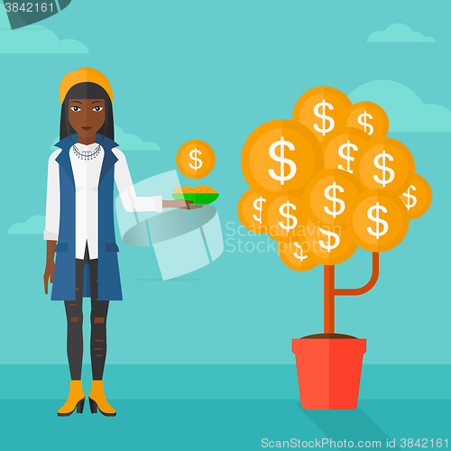 Image of Woman catching dollar coins.