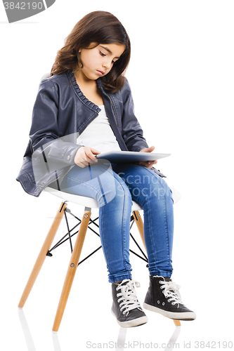 Image of Young girl using a tablet