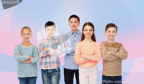 Image of happy smiling children with crossed hands