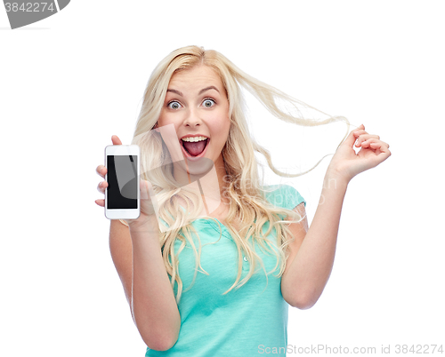 Image of happy young woman or teenage girl with smartphone