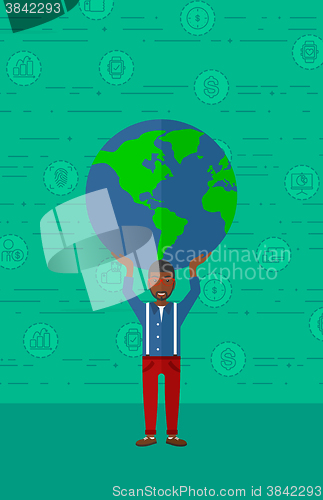 Image of Man holding globe.