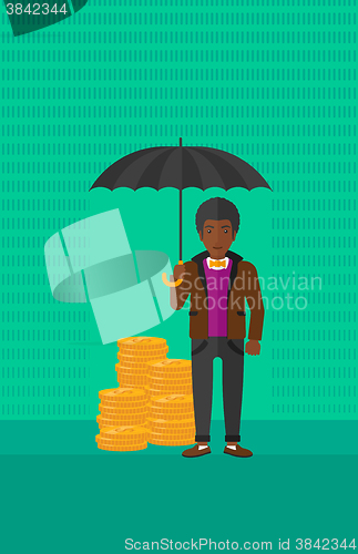 Image of Man with umbrella protecting money.