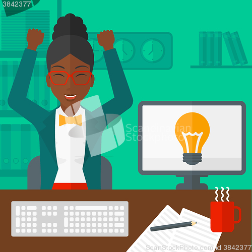 Image of Woman working at office.
