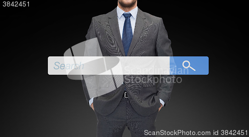 Image of close up of businessman with internet search bar