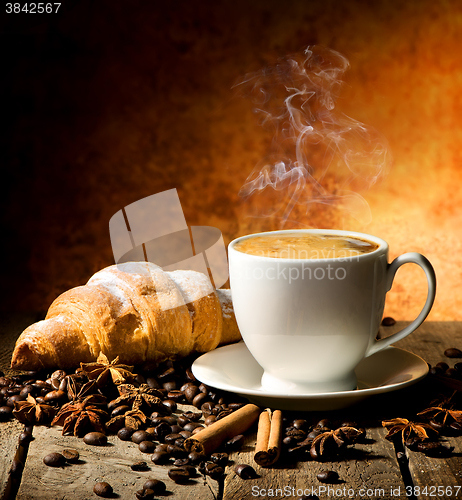 Image of Fresh croissant and coffee