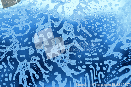 Image of Foam abstract pattern on the glass