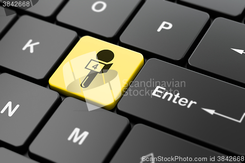 Image of News concept: Microphone on computer keyboard background