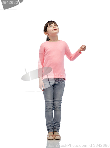 Image of girl looking up and holding something invisible