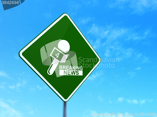 Image of News concept: Breaking News And Microphone on road sign background