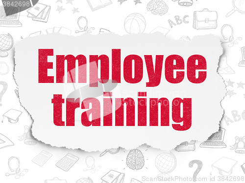 Image of Education concept: Employee Training on Torn Paper background