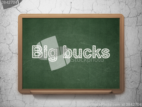 Image of Finance concept: Big bucks on chalkboard background